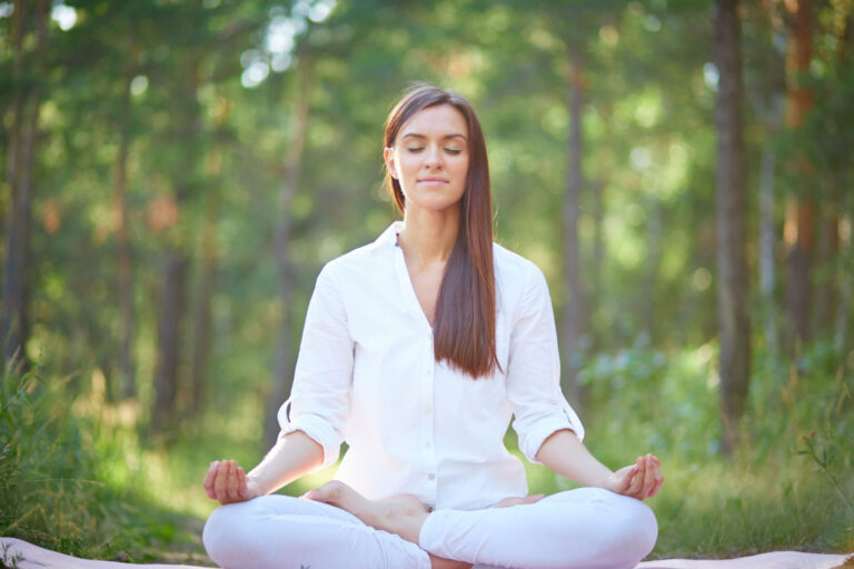 concentrated-woman-meditating-nature (1)